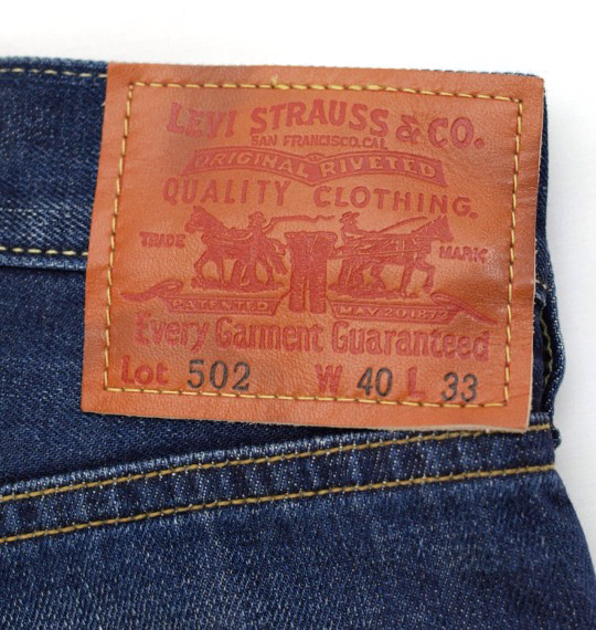 Levi's デニムパンツ(502) ニューミッドウォーン